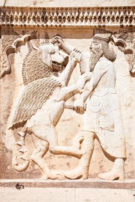 Depositphotos_9195677-stock-photo-persian-soldier-bas-relief-killing